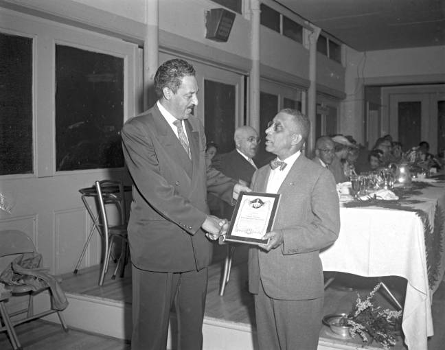 Thurgood Marshall Receiving NAACP Plaque from Carl Murphy, ca. 1956. Paul Henderson, HEN.00.A2-148. 